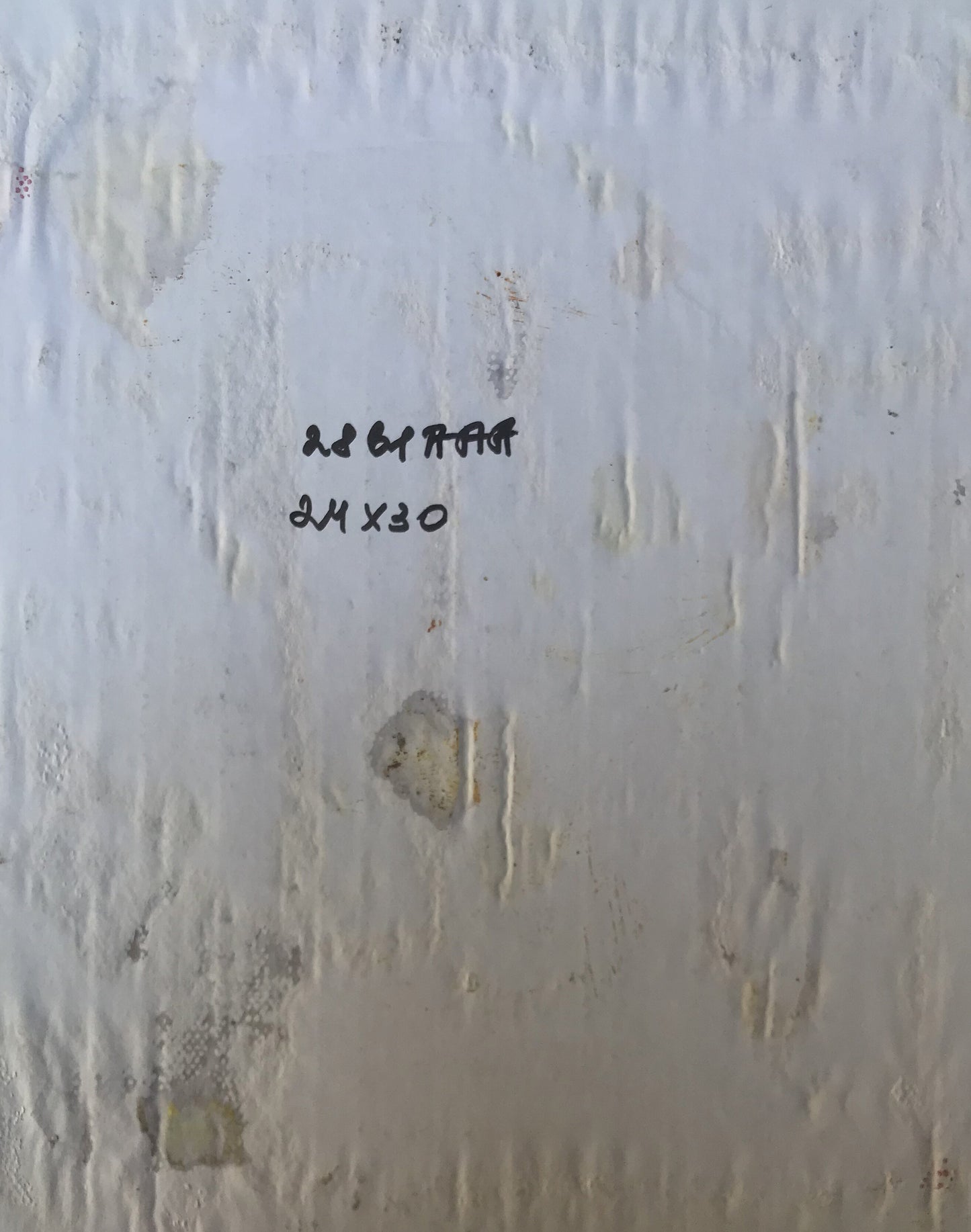 Back of Alexander Litvinov oil portrait on white textured wall with faint black markings