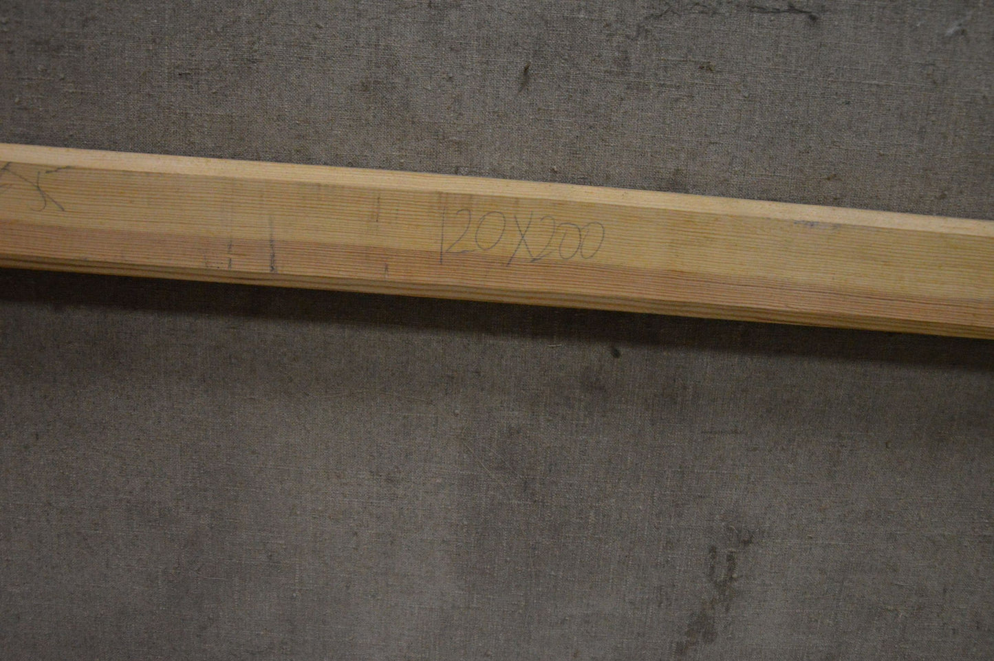 Light wooden beam with engraved markings on Oil painting Walk through the woods