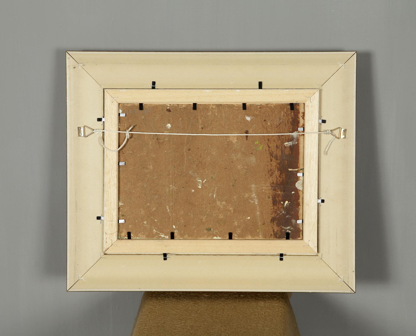 Back of beige distressed rectangular frame for Oil Painting In the Forest