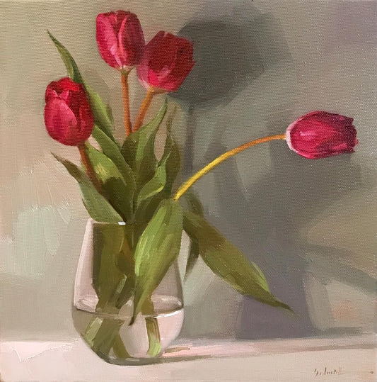 Clear glass vase with vibrant red tulips by Jean-Leon Gerome