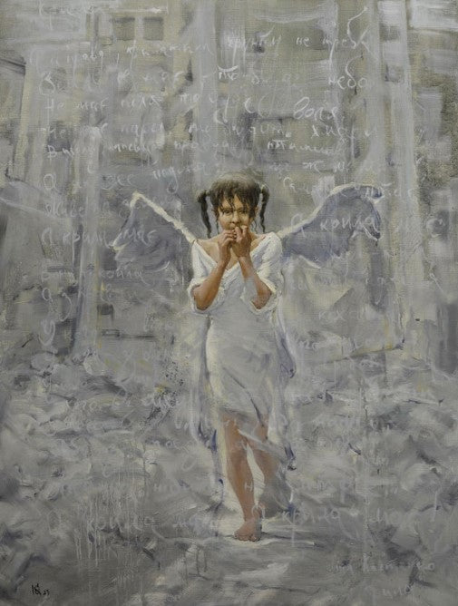 Delicate white angel figurine with translucent wings in soft pastels