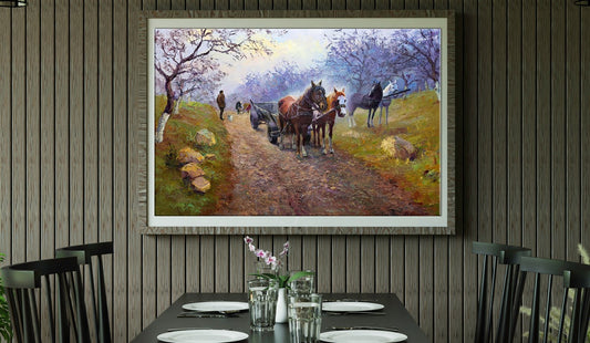 Framed pastoral landscape painting with horses on dirt path in white frame