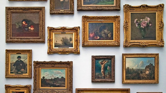 Gold-framed paintings with ornate gilded detailing