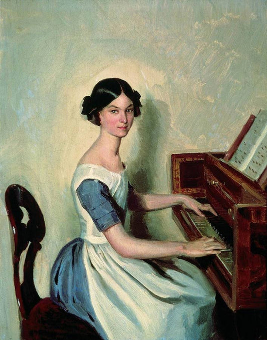 Artistic woman in blue dress at ornate piano with sheet music