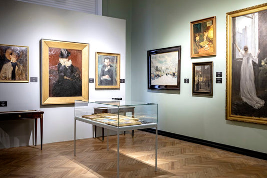 Glass display case with silver frame for paintings