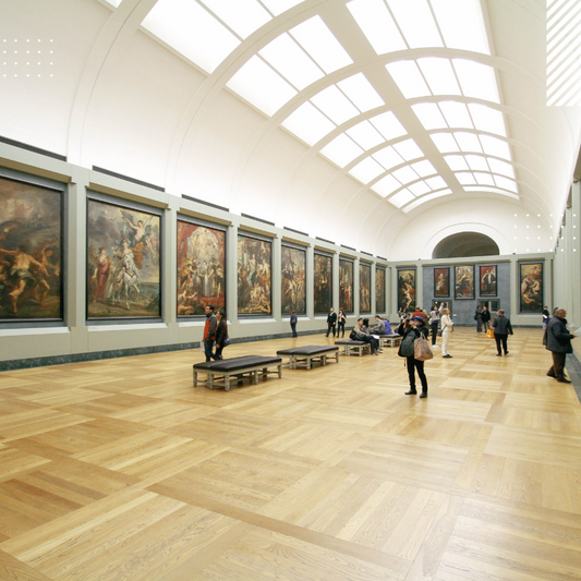 Long gallery wall of ornate historical paintings in dark frames