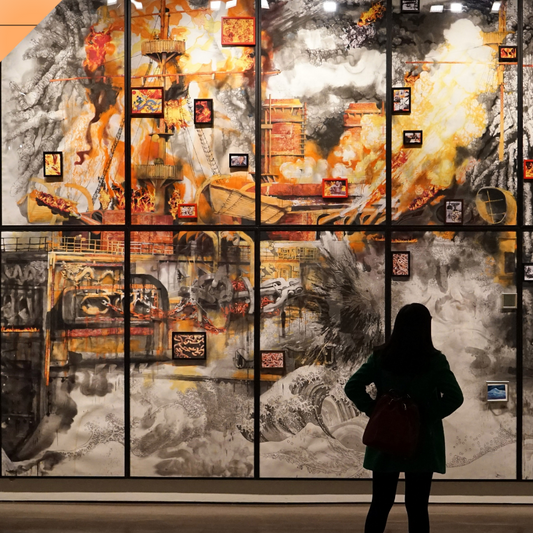 Fiery industrial mural in gallery, valuable art investment