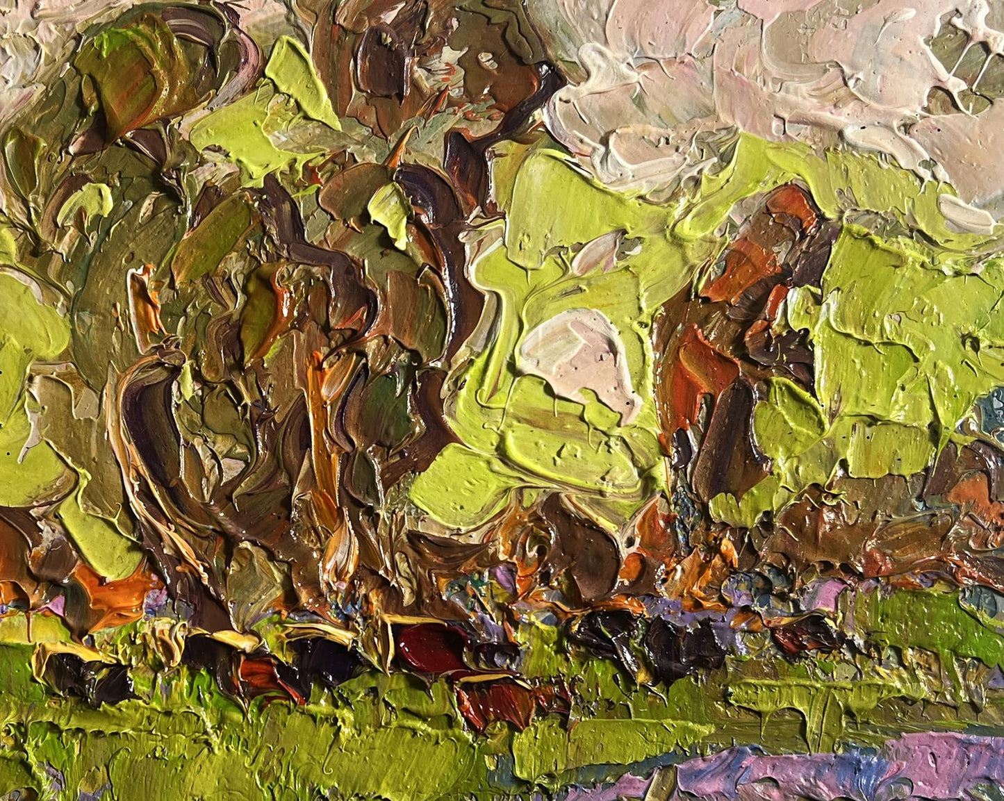 Oil painting of lush meadows behind village by Oleksiy Ivanyuk