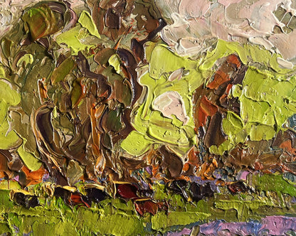 Oil painting of lush meadows behind village by Oleksiy Ivanyuk