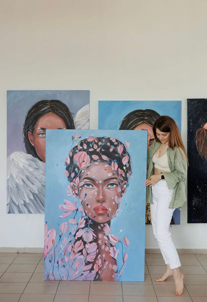 Oil painting Transformation Victoria Kagalovska: woman with pink blossoms on blue background