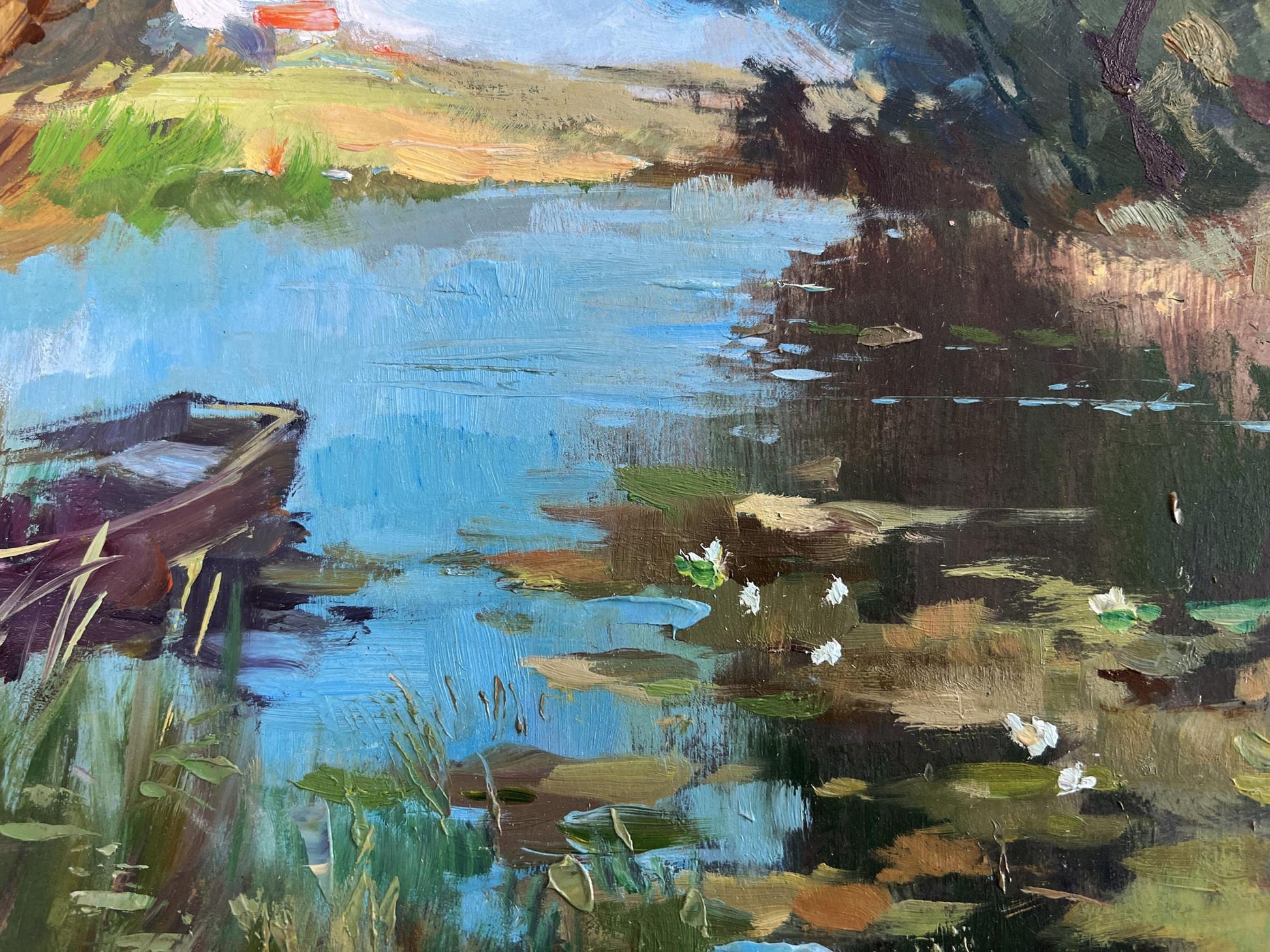 Oil painting by Yuriy Suprunchuk of rustic rowboat on lily pad pond