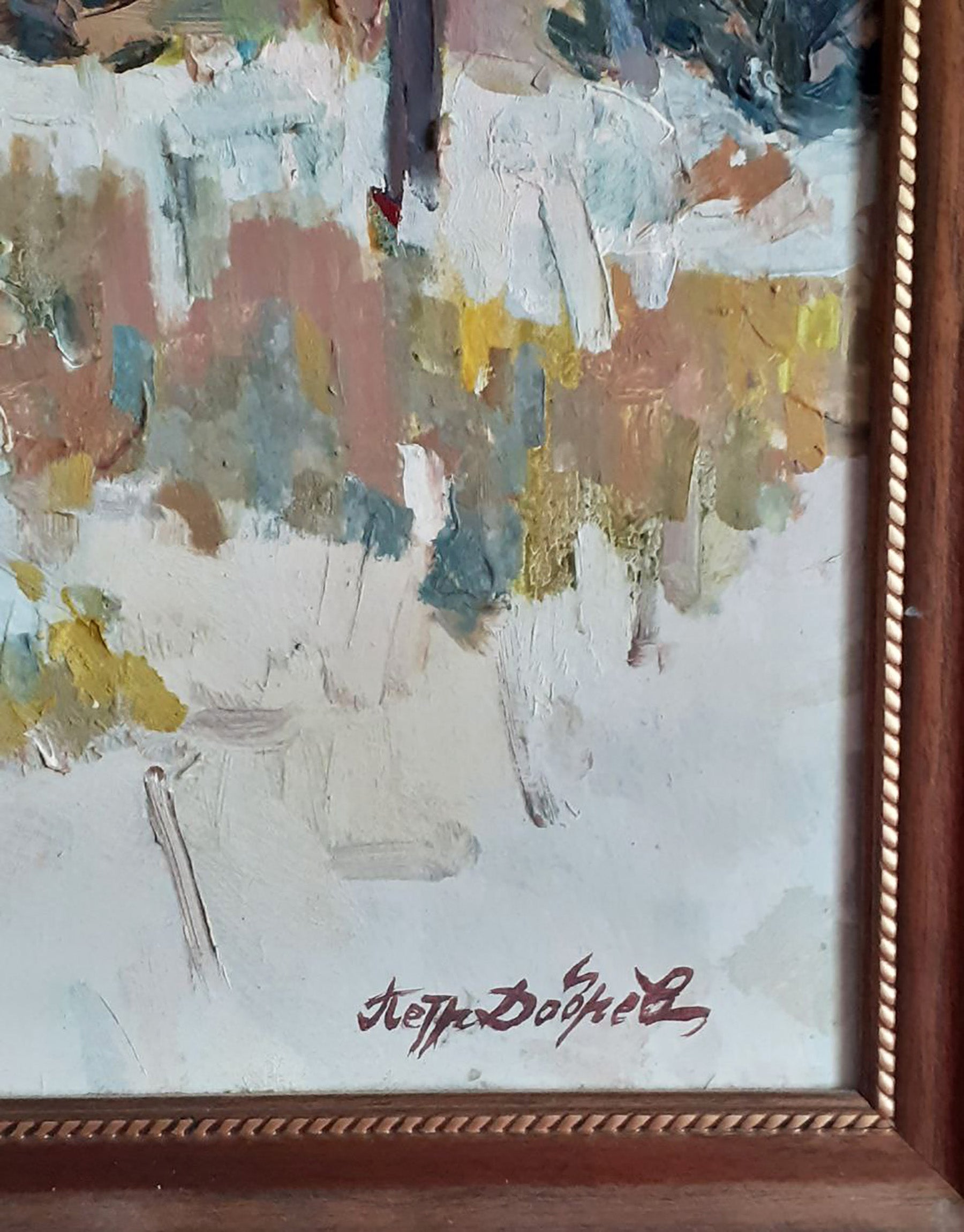 Oil painting of snow-covered Christmas trees by Peter Dobrev in wooden frame