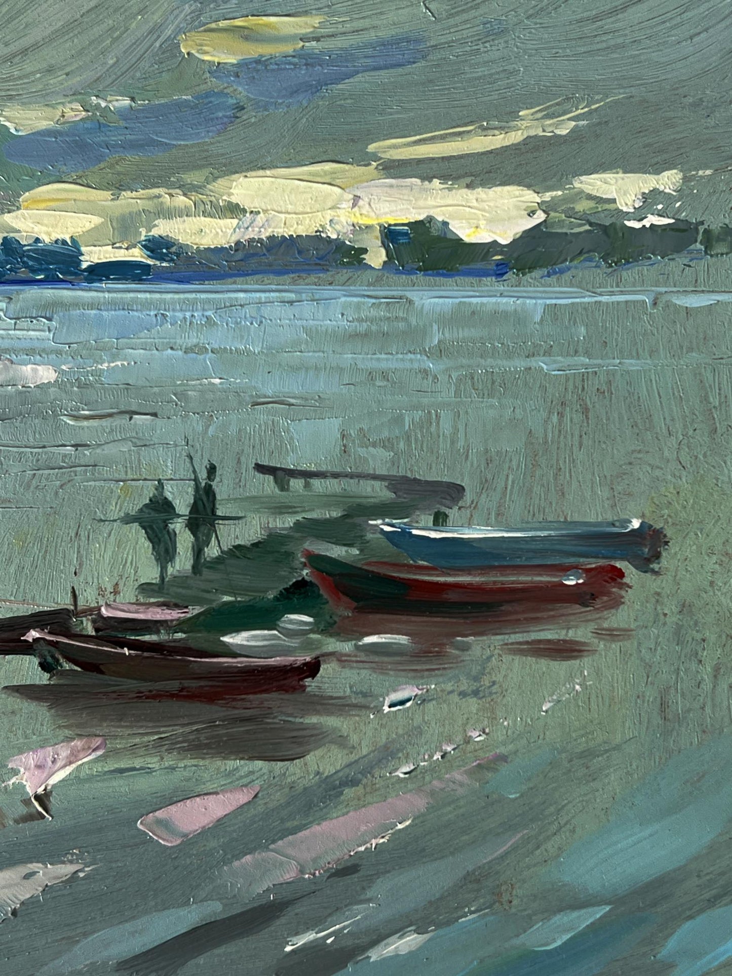 Oil painting of houses on water with boats by Yuriy Suprunchuk