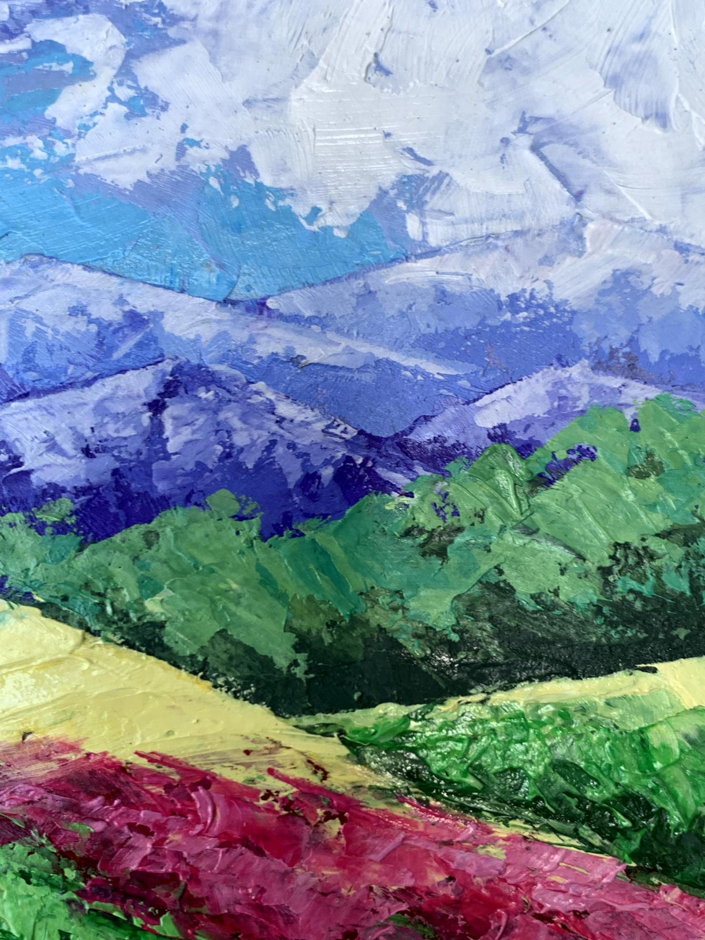 Vibrant oil painting of layered mountains and clouds by V. Zadorozhnya
