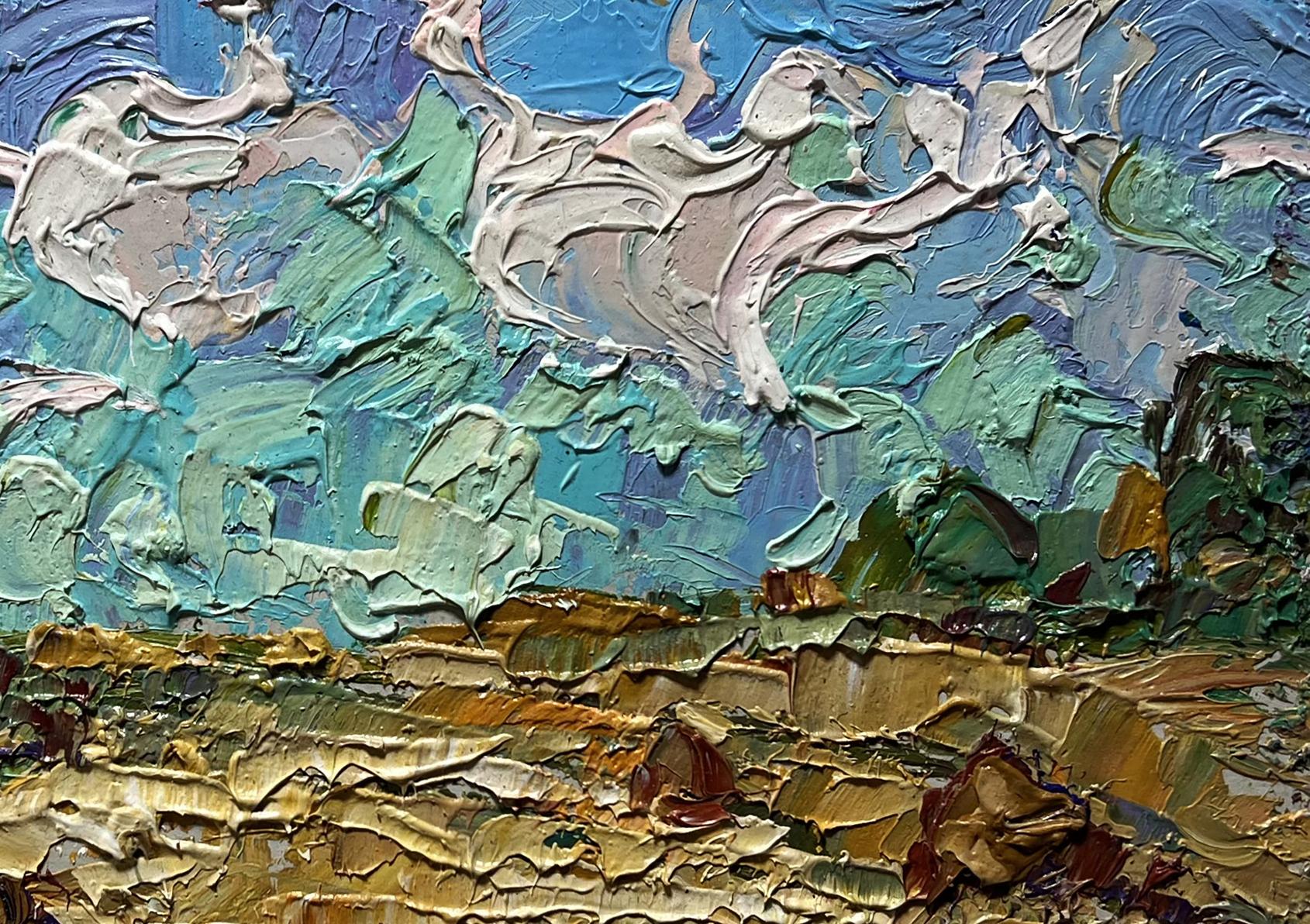 Oil painting of white clouds over field by Oleksiy Ivanyuk in blue green gold impasto