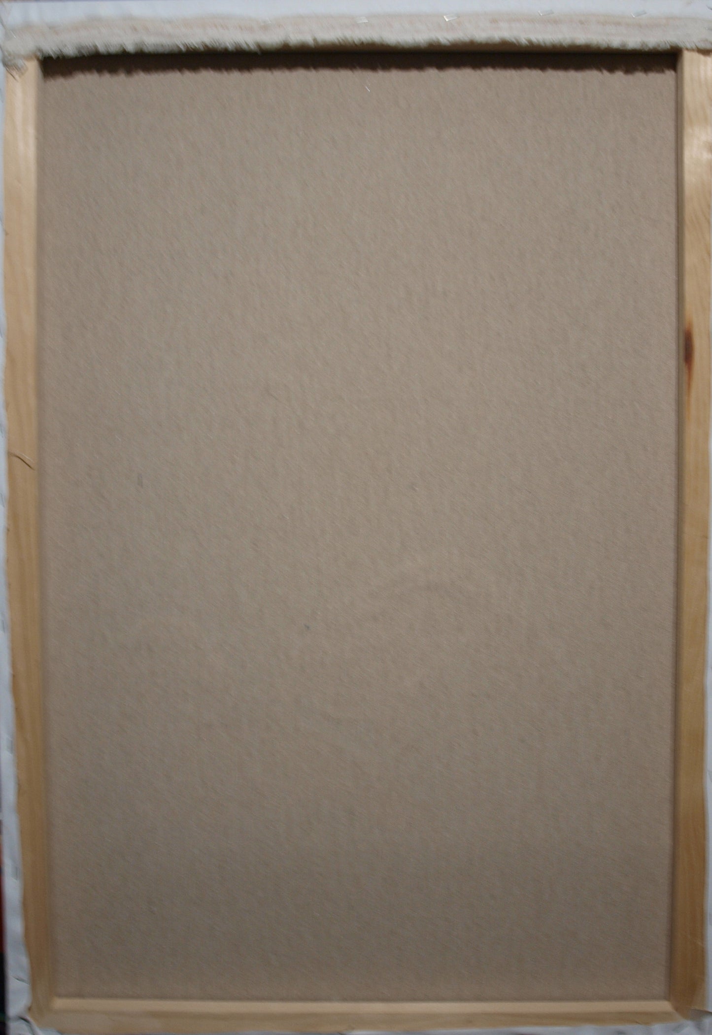 Back of Oil painting Fate by Konsta G. Amelinn on beige canvas over light wood frame