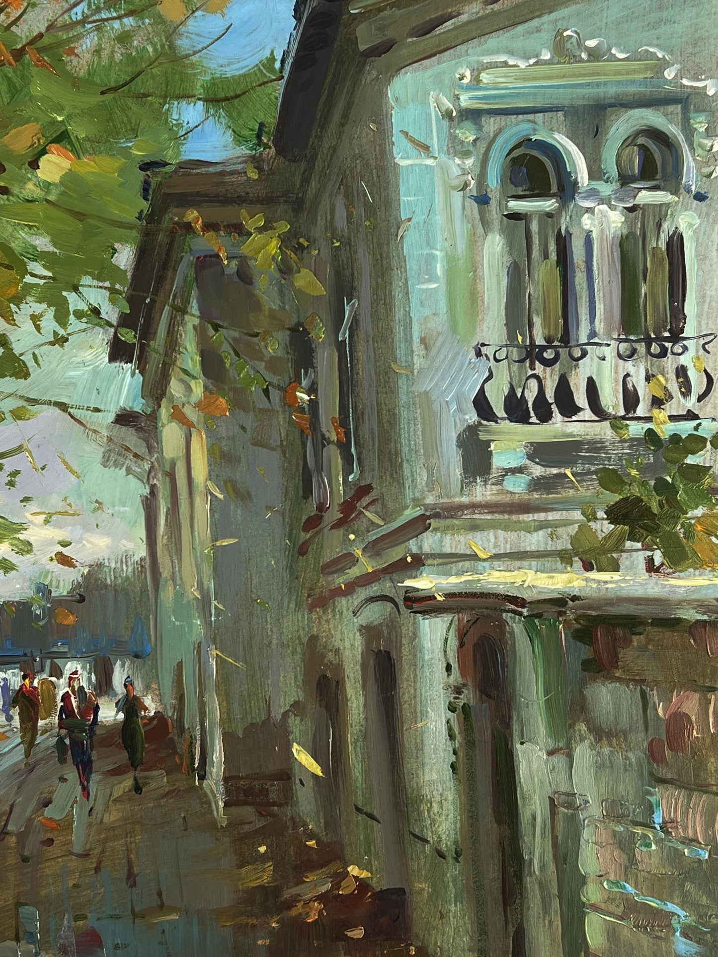 Oil painting of daytime city street by Yuriy Suprunchuk, blue-gray building under autumn trees