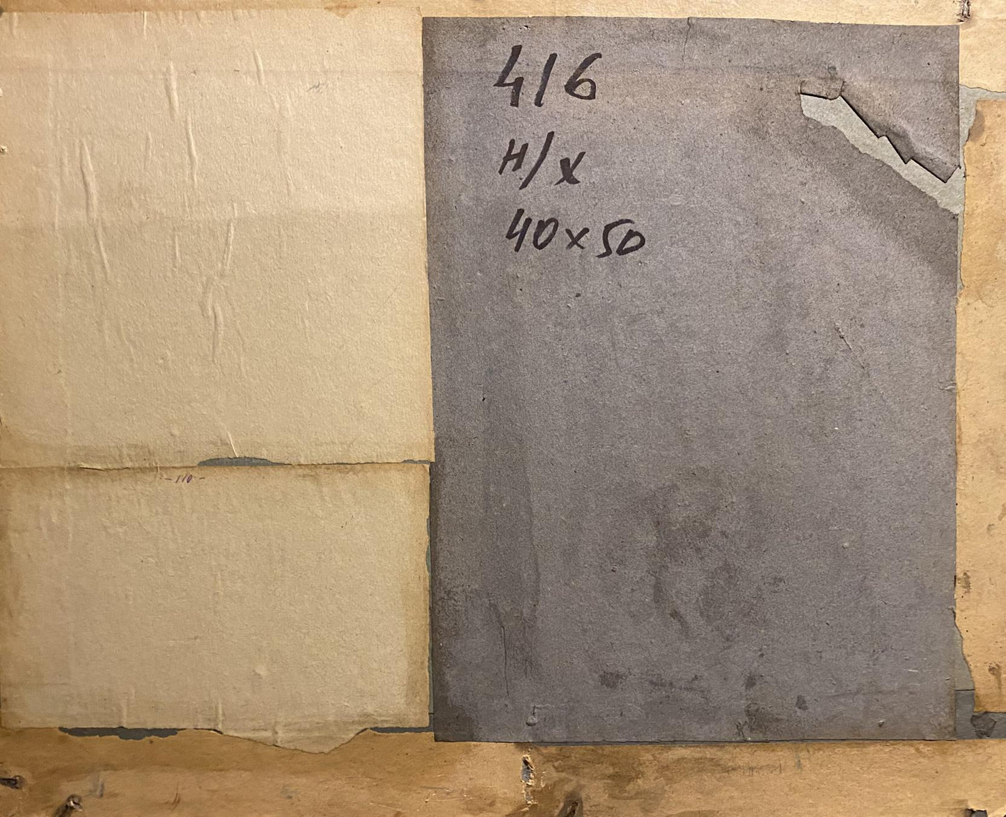 Back of oil painting Summer forest: gray rectangular panel with handwritten markings and torn edge
