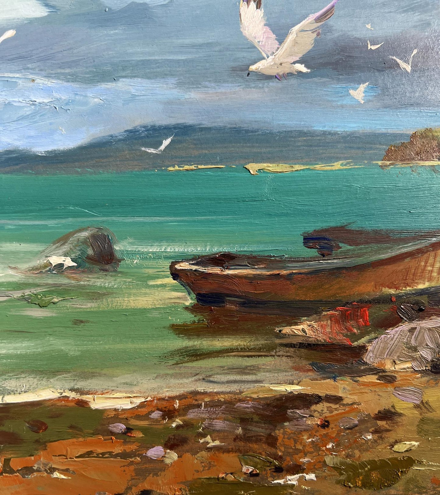 Oil painting Bound by the Current by Yuriy Suprunchuk: weathered rowboat on pebbled shore