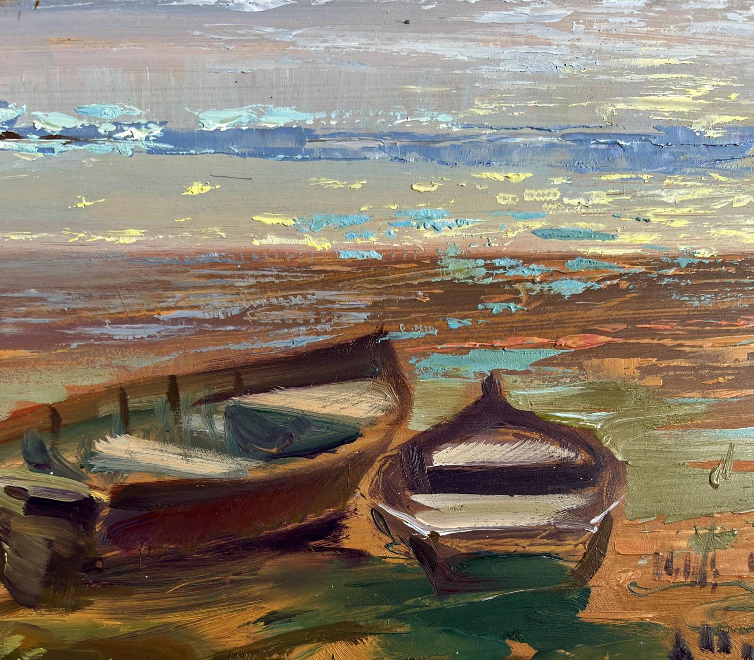Oil painting of crimson sunset with rowboats on shore by Yuriy Suprunchuk