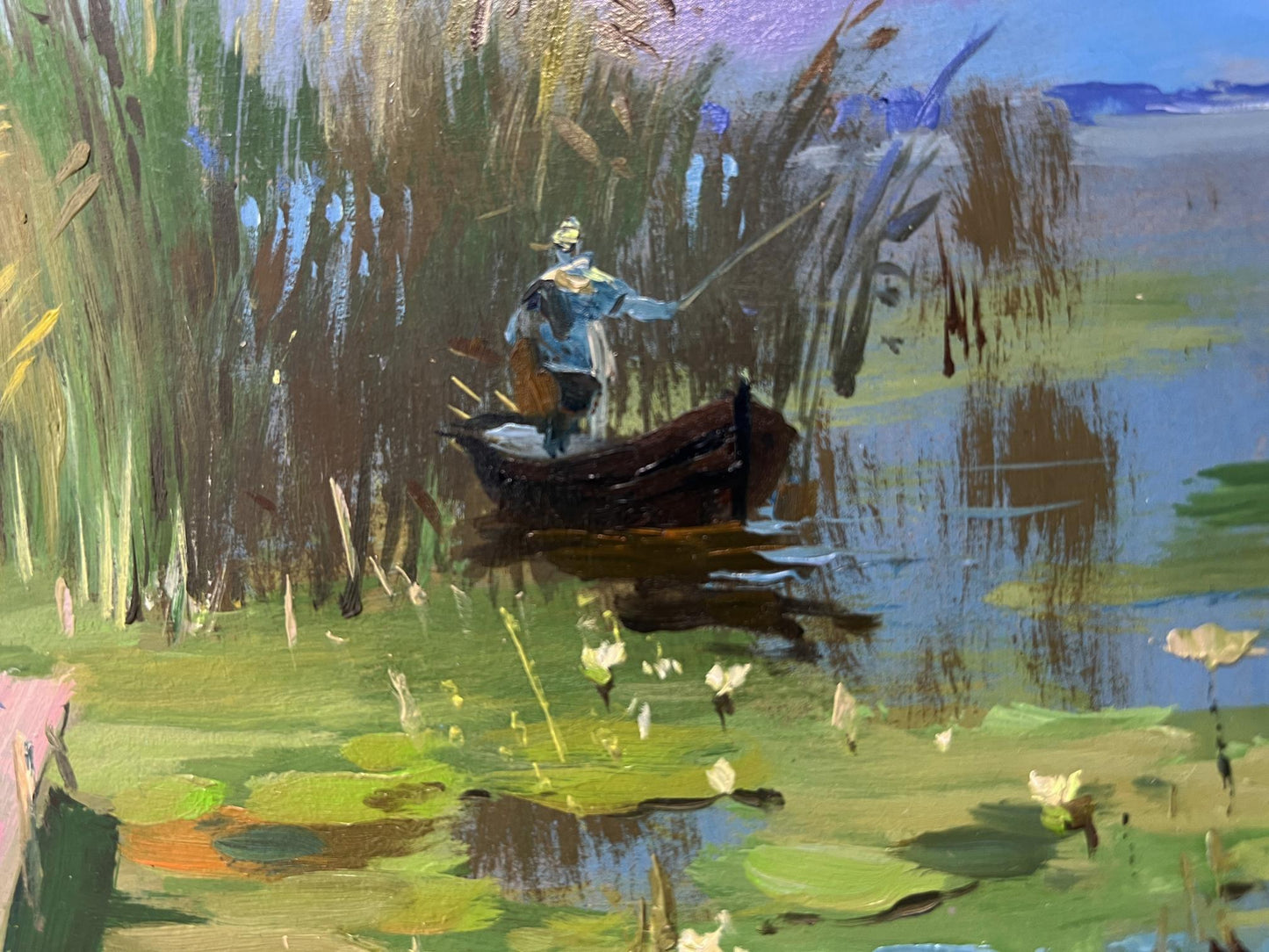 Oil painting of lone fisherman in rowboat near reeds by Yuriy Suprunchuk
