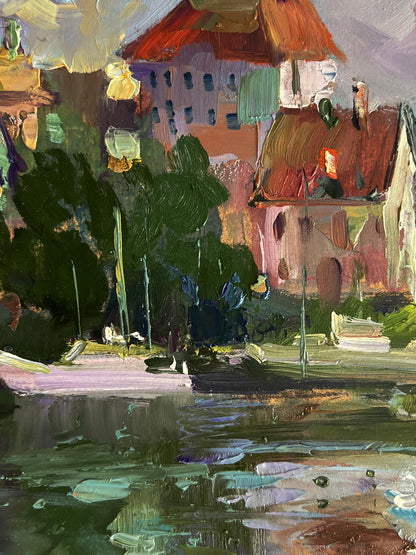 Vibrant impressionist oil painting of riverside houses by Yuriy Suprunchuk