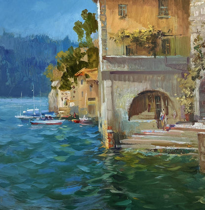 Vibrant impressionist oil painting by Yuriy Suprunchuk of sunlit lakeside town