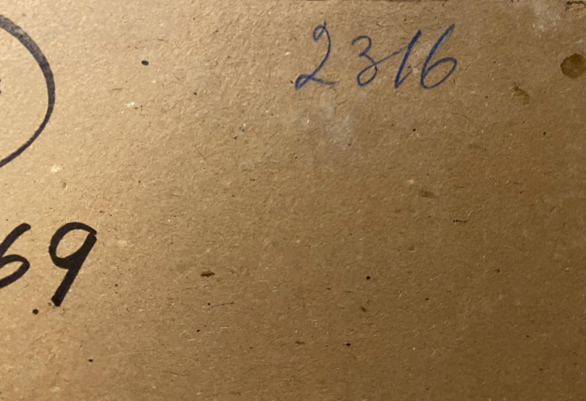 Back of Oil painting Dnieper near Zaporozhye by Georgy Kolosovsky with handwritten 2316 and 69 in blue ink on brown cardboard