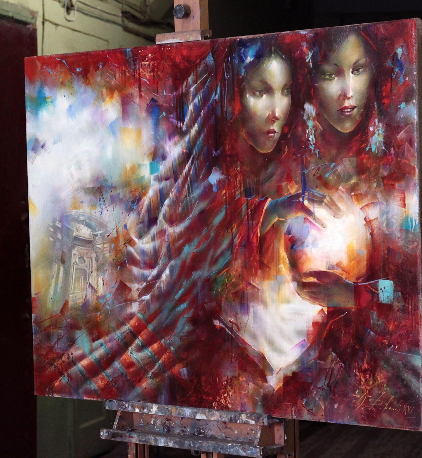 Vibrant oil painting Glowing ball by Alexander Dobrodiy with two women in reds and blues