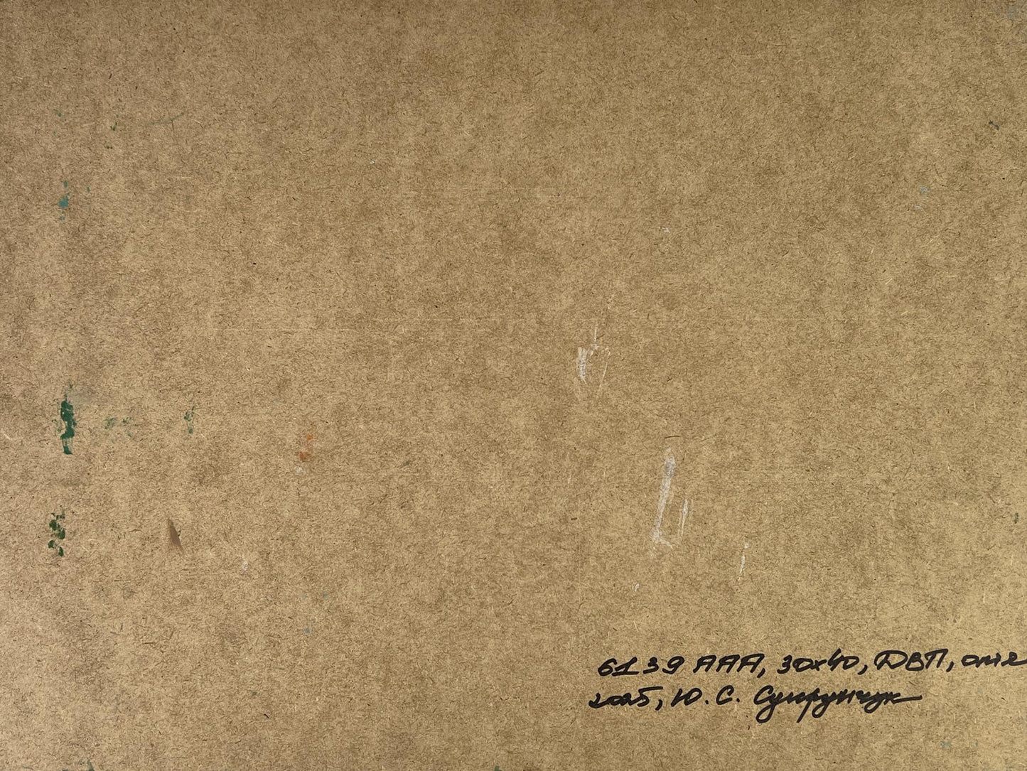 Back of Yuriy Suprunchuk oil painting Ships at the mountain with brown textured paper inscription