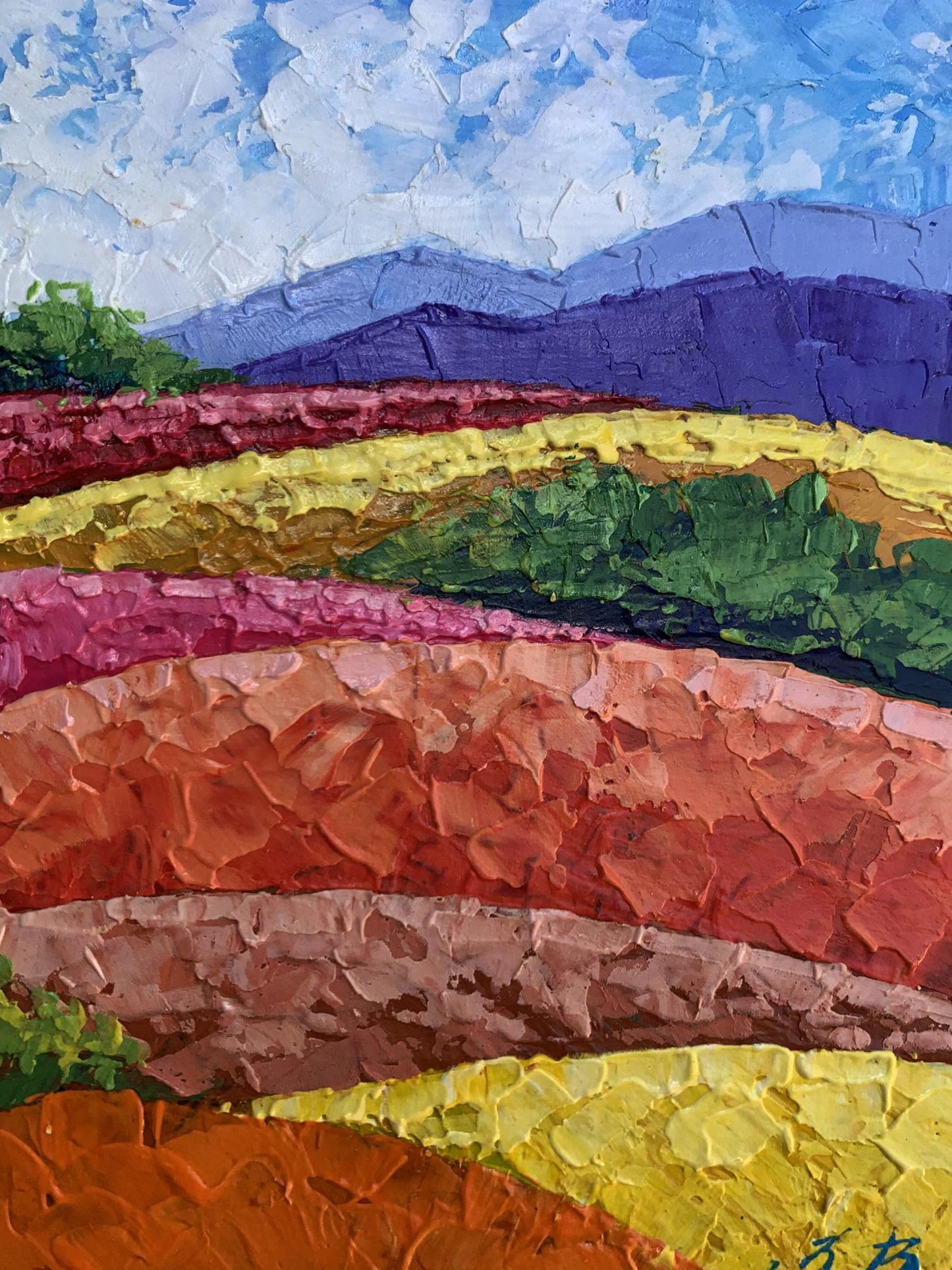 Vibrant oil painting of striped fields and mountains by V. Zadorozhnya