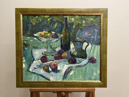 Oil painting by Oleksandr Andreev: still life with green purple fruits bottle pitcher