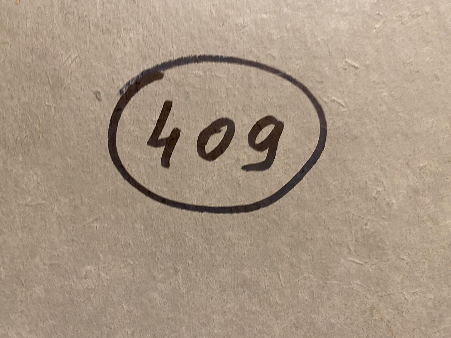 Hand-drawn black oval 409 on back of Oil painting April Awakening Grigoriy Ruban