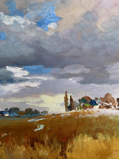 Oil painting Not far from the village by Yuriy Suprunchuk golden field dramatic sky