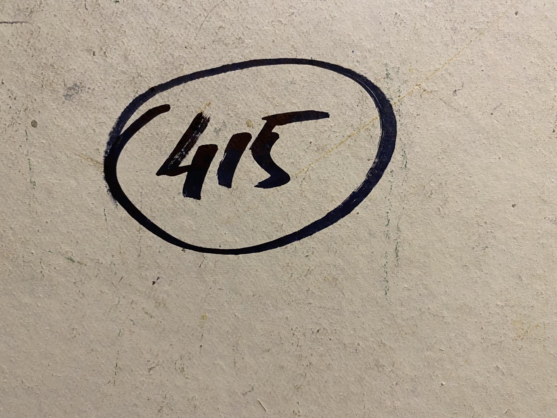 Back of Georgy Kolosovsky oil painting with circled black handwritten 415