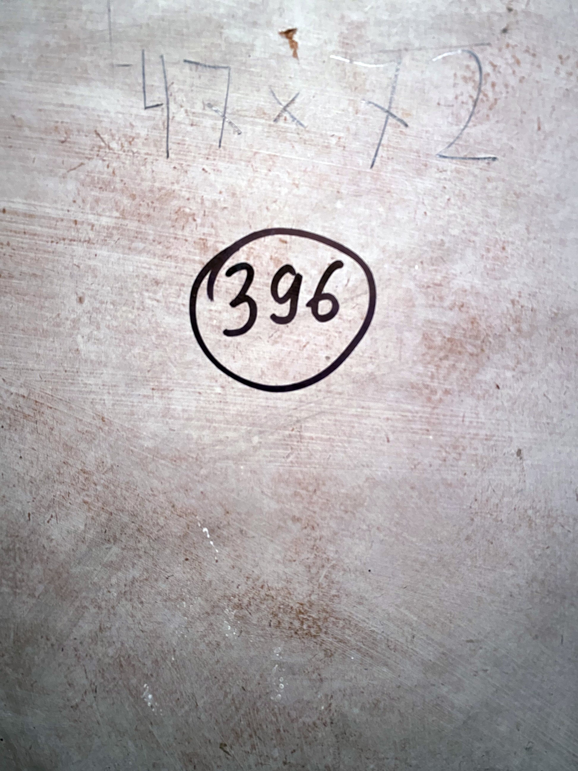 Back of Oil painting Still water Boris Talko with circled 396 and 47x72 on scratched metal