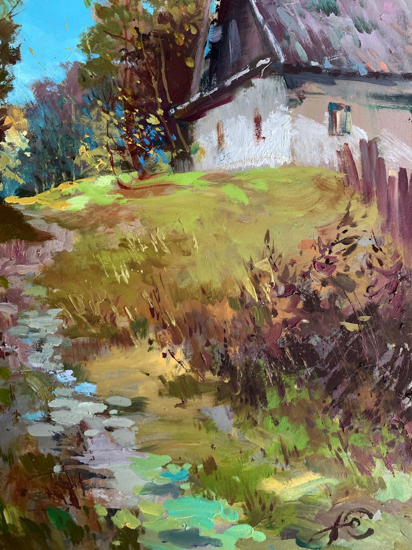 Oil painting Early morning in the village by Yuriy Suprunchuk: rustic white cottage amid autumn trees