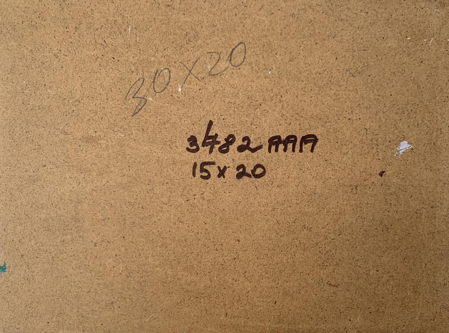 Back of Autumn days in the mountains V. Zadorozhnya oil painting with handwritten measurements and serial number on brown cardboard