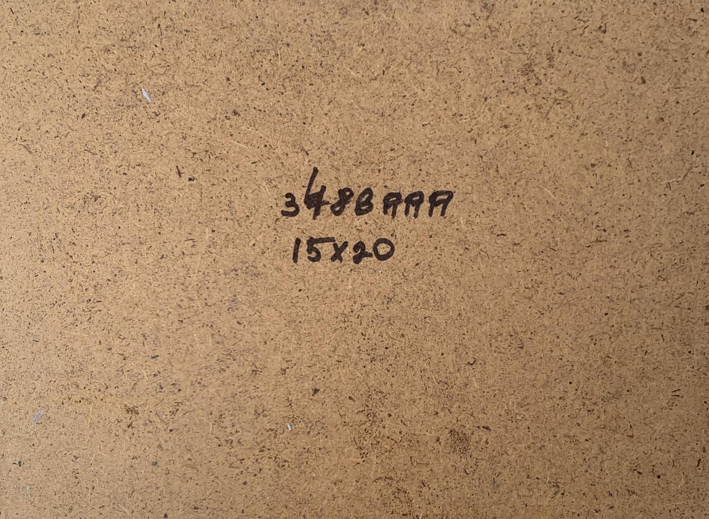 Back of V. Zadorozhnya oil painting with brown textured cardboard and handwritten markings