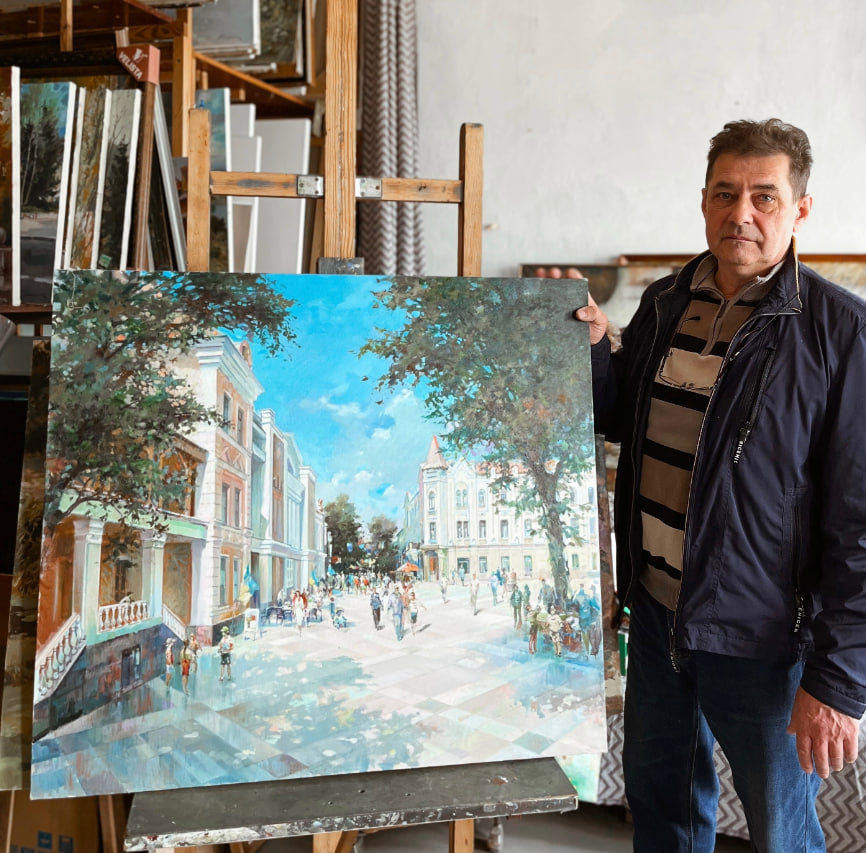 A vibrant oil painting on canvas depicting a bustling european street scene with pastel-colored buildings, lush green trees, and numerous pedestrians under a bright blue sky.