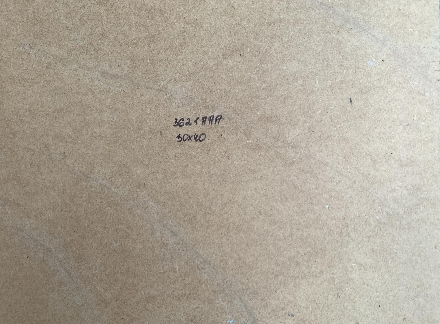 Back of Yuriy Suprunchuk oil painting with brown cardboard and handwritten markings