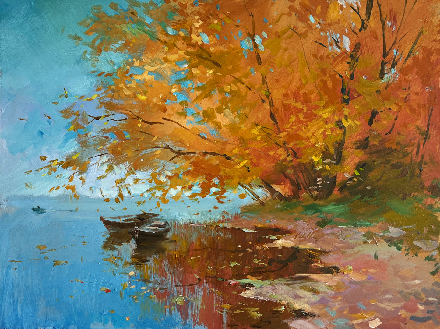 Vibrant autumn tree over serene blue lake with boats - Yuriy Suprunchuk fine art