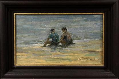 Framed oil painting of two figures in shallow ocean water by Volodymyr Pashchenko