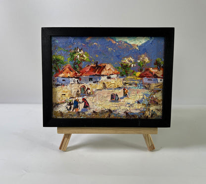 Vibrant Oleksiy Ivanyuk oil painting of sunny village street in black frame