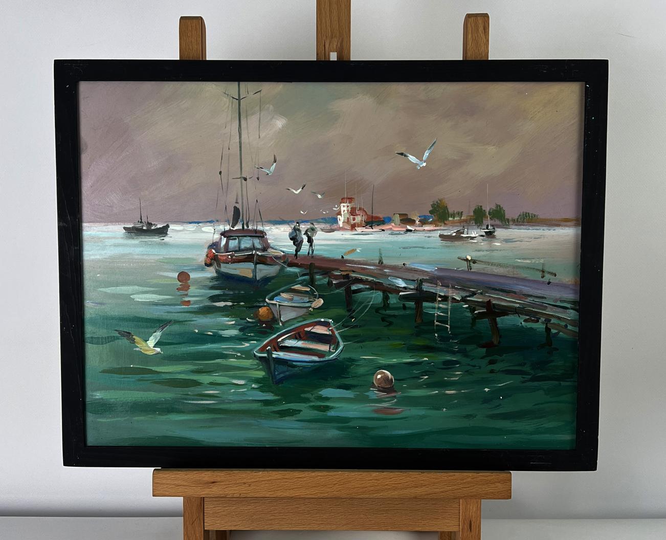 Framed oil painting of seagulls flying on pier by Yuriy Suprunchuk