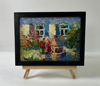 Oil painting At the well in the yard by Oksana Ivanyuk in black frame
