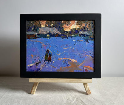 Oil painting Walk on a winter evening by Oleksiy Ivanyuk in black frame