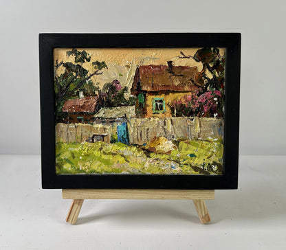 Oil painting Light at day’s end by Oleksiy Ivanyuk: rustic village scene