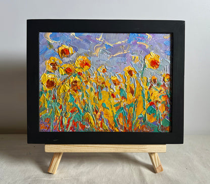 Oil painting To the sky by Oleksiy Ivanyuk: vibrant sunflowers in black frame