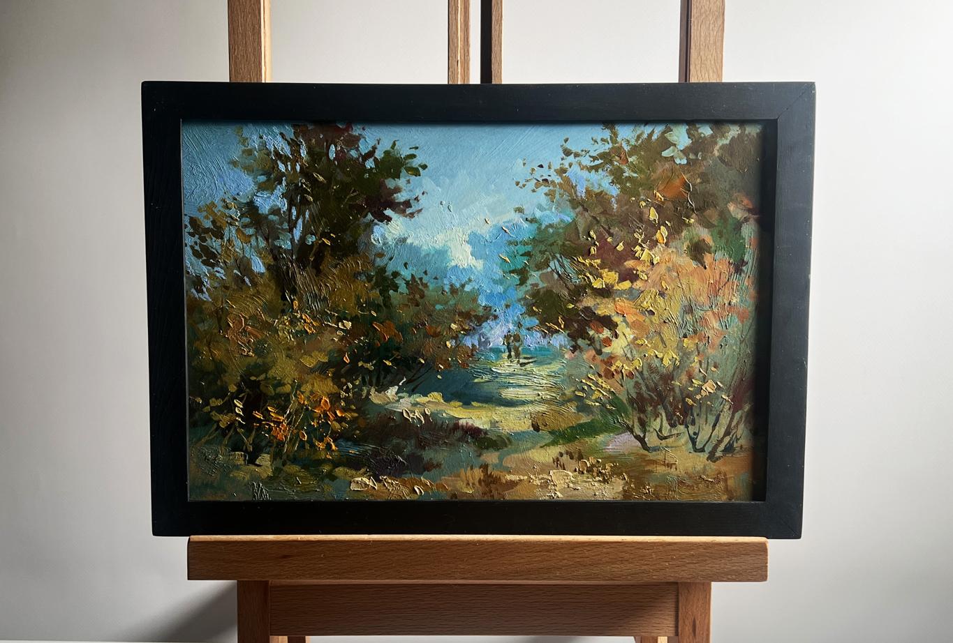 Oil painting Walking in the autumn forest by Yuriy Suprunchuk in black frame